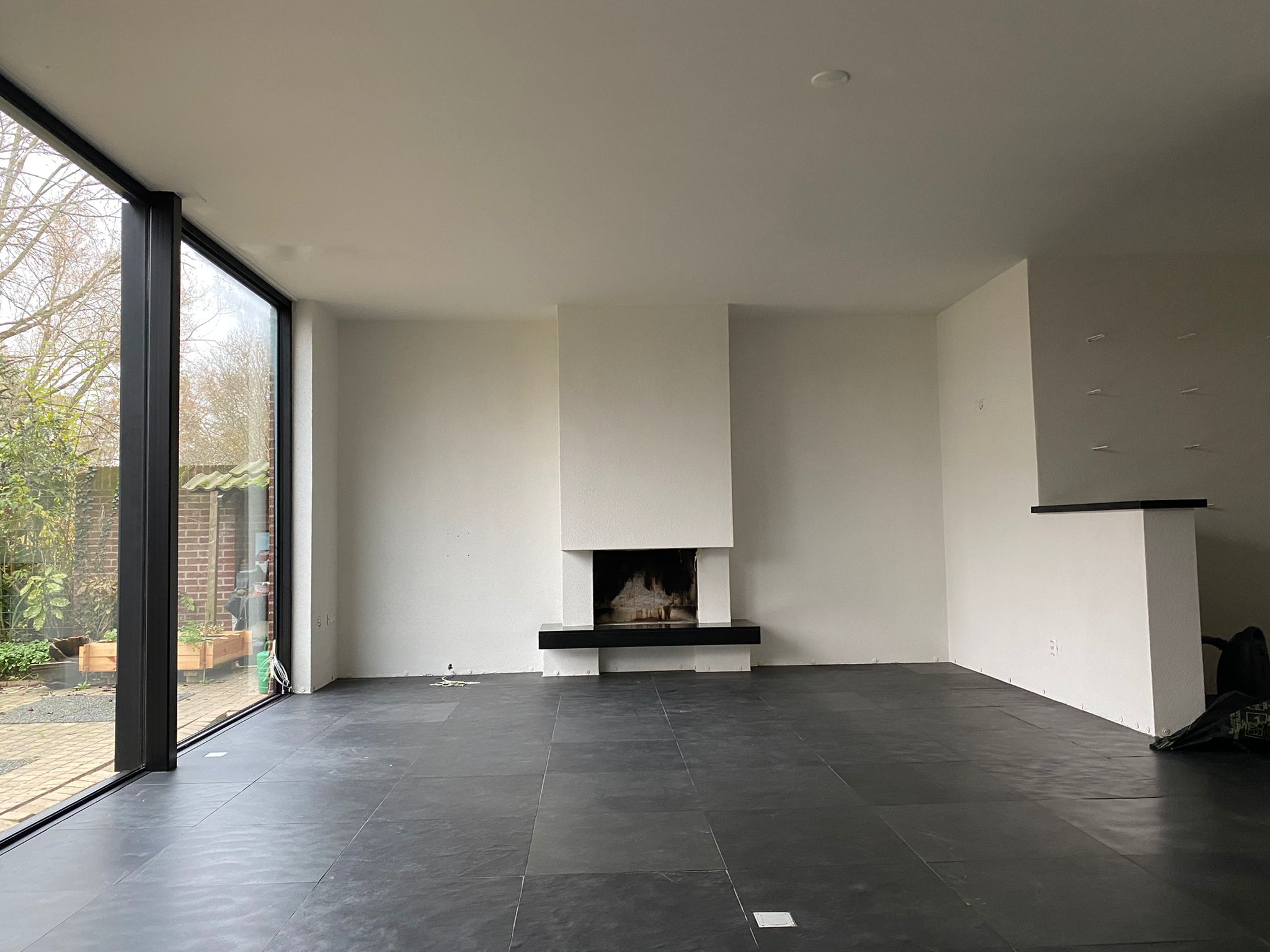 Gespoten woning huissen