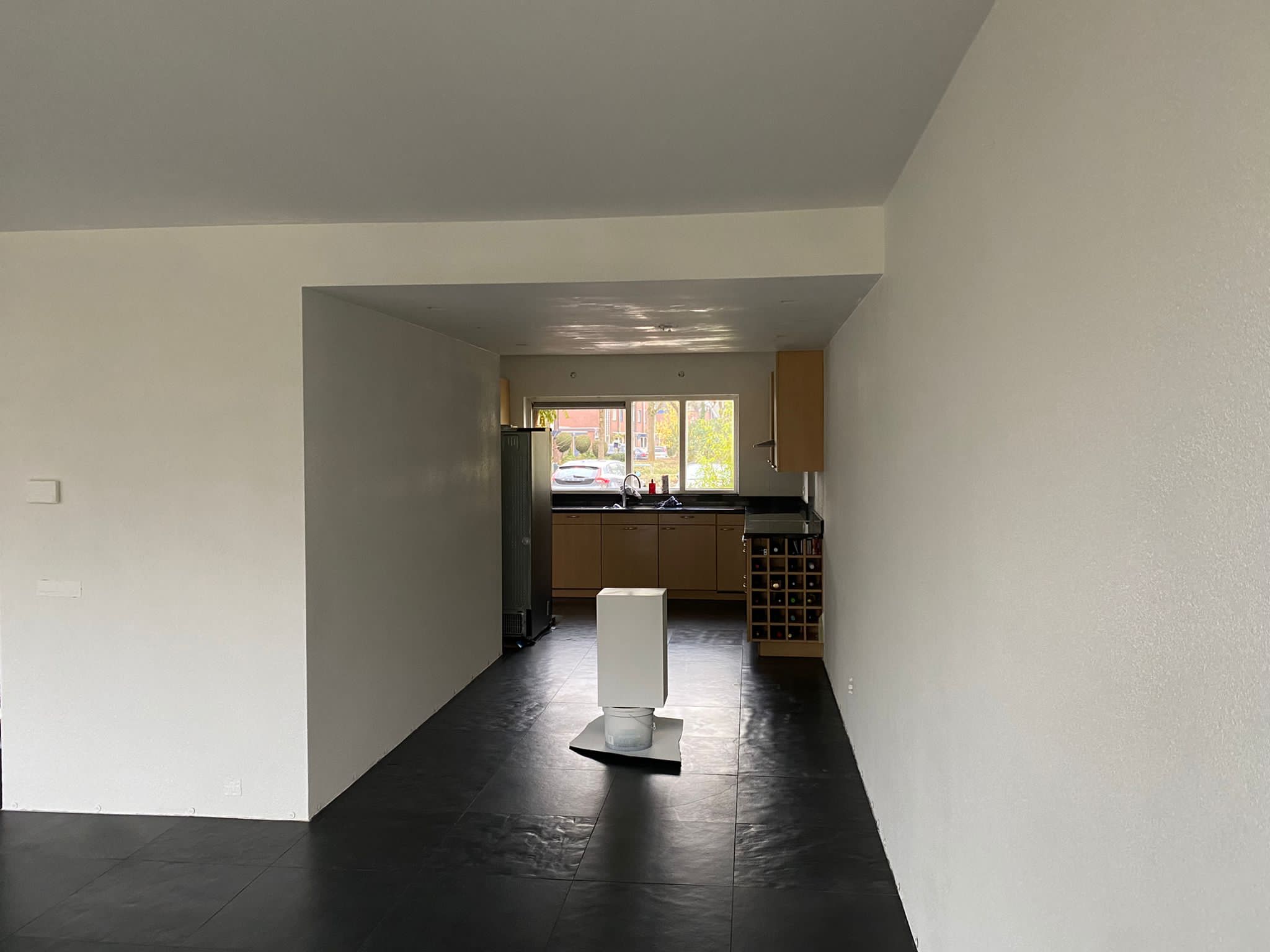 Gespoten woning huissen