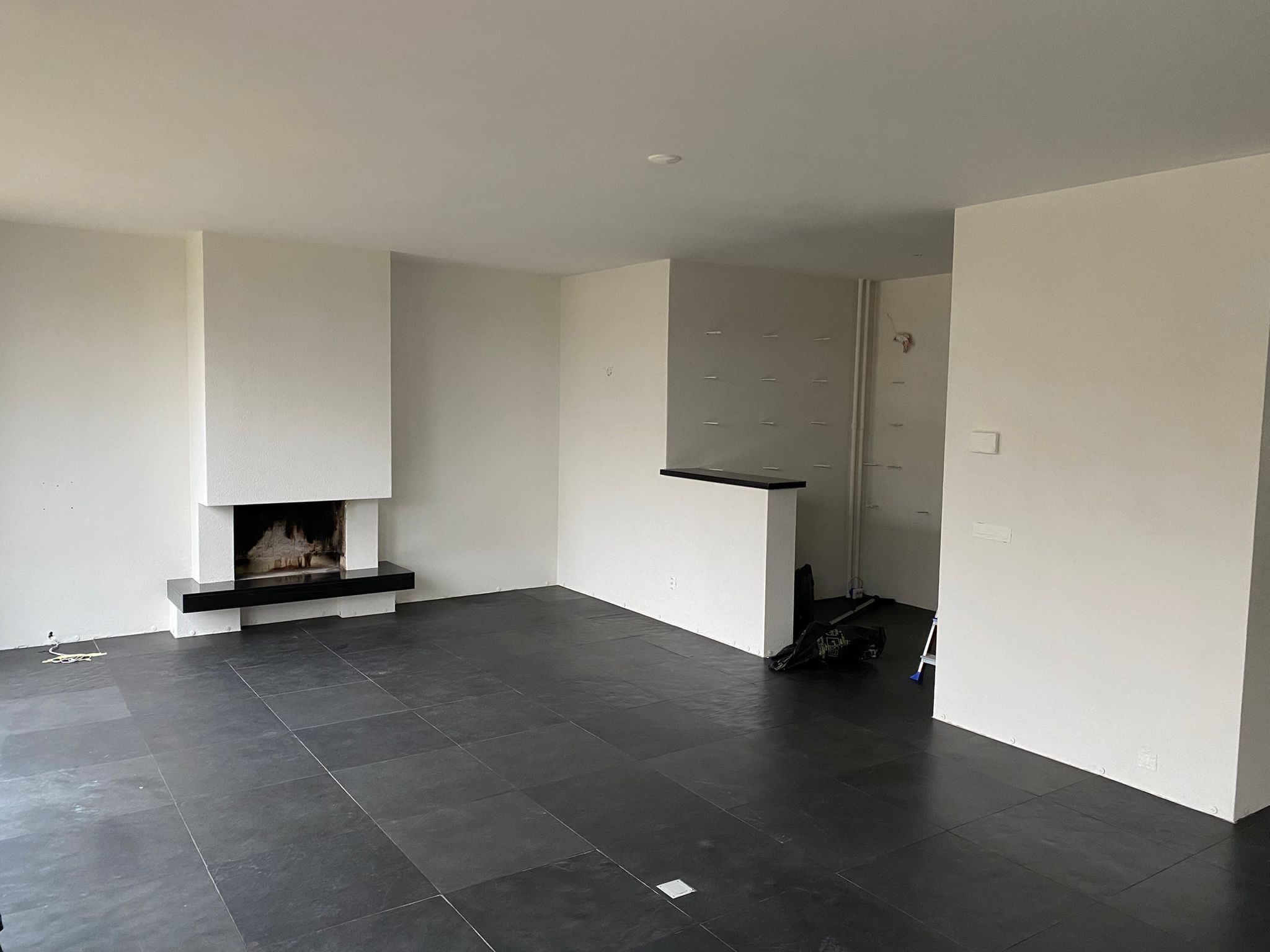 Gespoten woning huissen